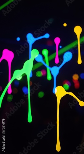 Vivid neon liquid drips illuminate a deep black background with subtle light effects.
