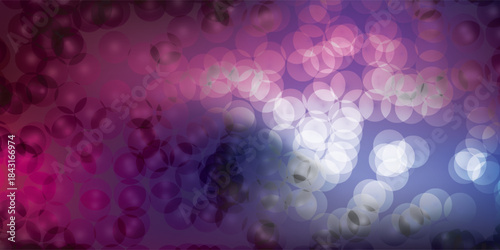 Abstract bokeh lights background with purple and pink hues.
