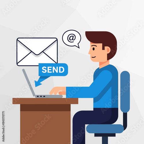 Man Sending Email with Laptop Computer at Desk