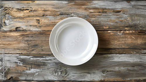 Empty White Plate on Rustic Wooden Table Background