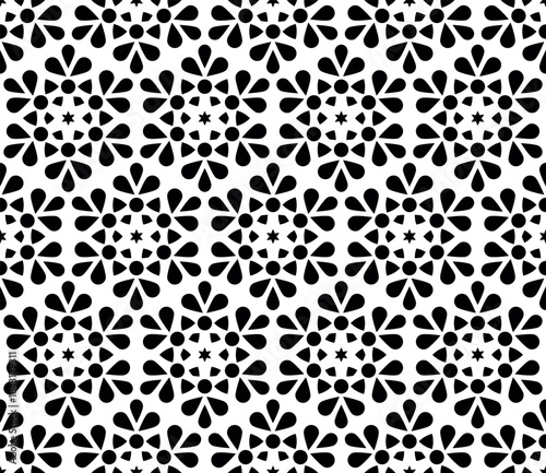 Flower geometric pattern. Seamless vector background. White and black ornament. Ornament for fabric, wallpaper, packaging. Decorative print.