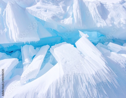 Fractured ice, white and pale blue shards pile high