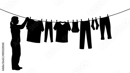 Woman Hanging Clothes on a Line Outdoors