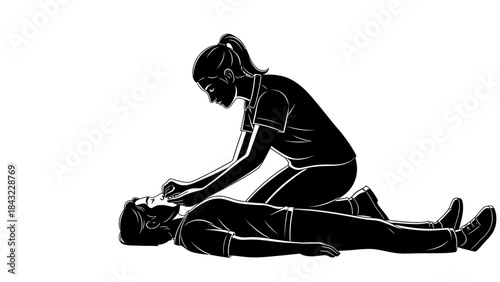 A person performing CPR on another individual on the ground in a medical emergency