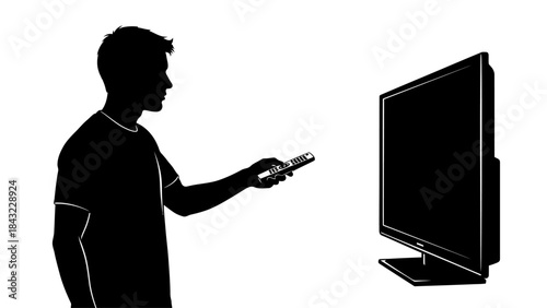 Man standing in front of television holding remote control in hand