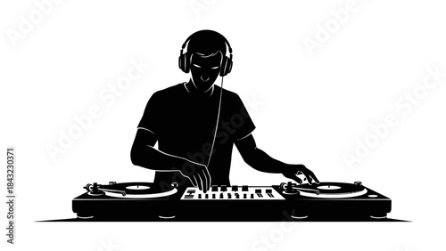 Silhouette of a DJ wearing headphones, mixing music on turntables in a club setting