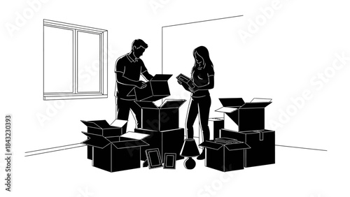 Couple Packing Boxes for Moving Day with Framed Photos and Memories