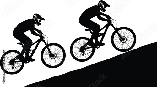 Silhouette mountain biker riding uphill on rugged terrain with helmet, showing motion, strength, endurance, outdoor adventure and physical effort