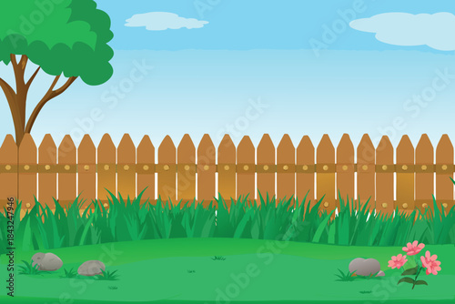 a serene backyard scene featuring a wooden fence lush grass and a