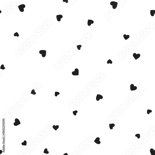 Abstract black spots scattered on a clean white background