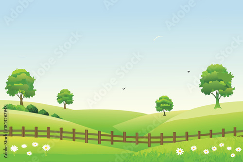 A peaceful landscape featuring rolling green hills trees a wooden fence and