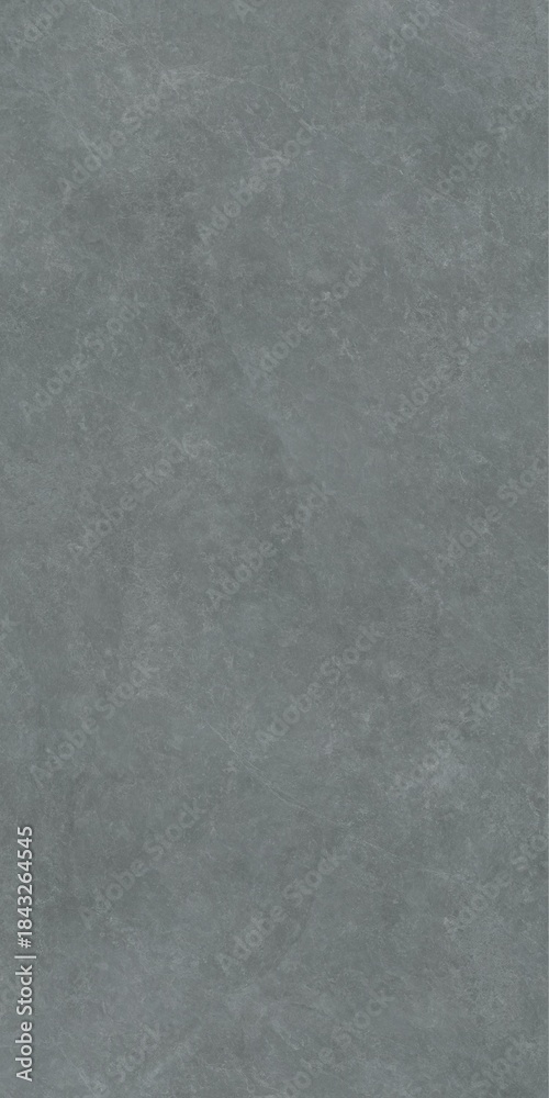 Fototapeta premium Close-up view of a textured gray surface with subtle variations in tone and pattern.