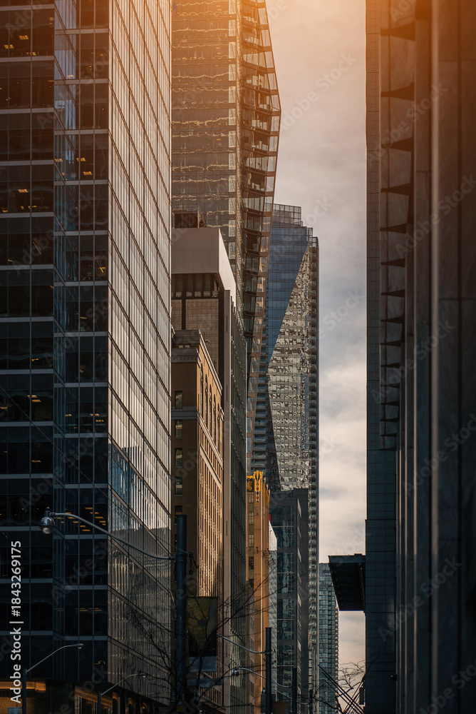Naklejka premium city street with tall skyscrapers buildings, modern architecture of steel and glass, skyline of big city