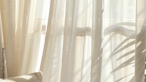 Room with white curtains swaying in gentle wind concept. Soft light filters through, creating a serene atmosphere with shadows on the wall.