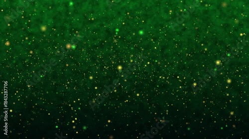 A rich green abstract background with glowing gold and emerald particles drifting softly, creating a magical festive atmosphere ideal for celebrations, fantasy visuals, and intros.