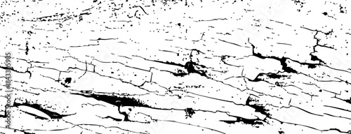High contrast black and white texture of cracked, weathered wood surface with peeling layers and rough grain, ideal for backgrounds, overlays, and grunge design elements.