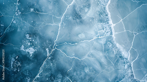 aerial view of frozen lake cracked ice pattern