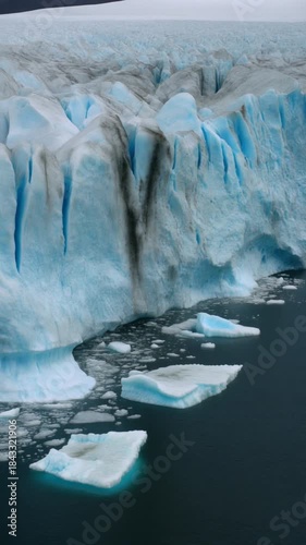 Melting Glacier and Iceberg Collapse Aerial Drone Shot