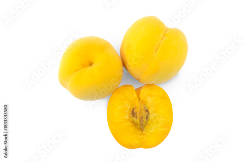 apricots isolated on white background, Fresh Plum Fruits isolated on white background with clipping path top view flat lay stack, whole and cut lengthwise