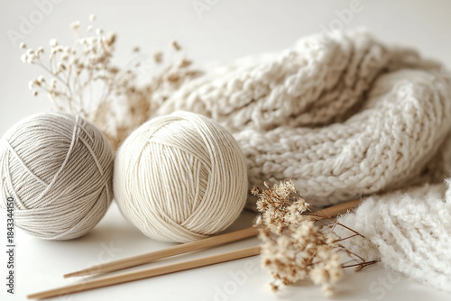 Soft yarn balls with needles and flowers generated.AI