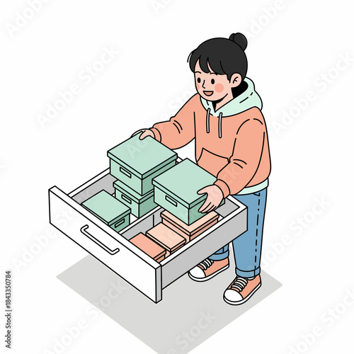 Young person organizing storage boxes in a drawer, a clean and tidy home organization concept