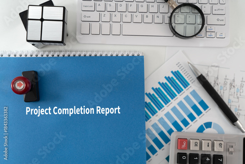 Illustrative Project Completion Report with Blue Document, Keyboard, Glass, and Charts in Background