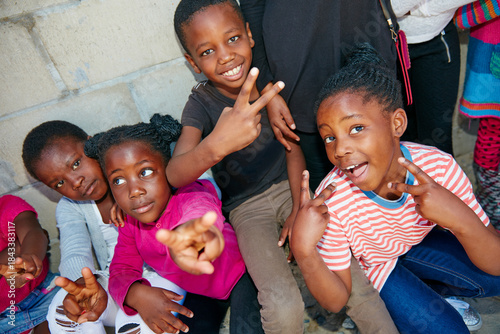 Canvas Print Happy, black children or group with outreach, youth or charity for adoption in rural area