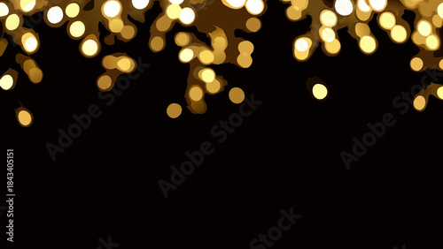 Blurred golden lights against a dark background creating a soft bokeh effect