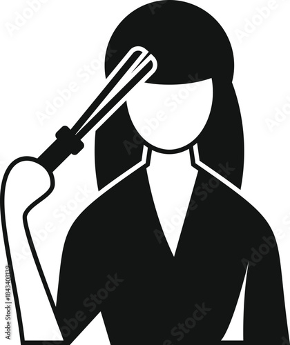 Woman holding a hair straightener, styling her hair