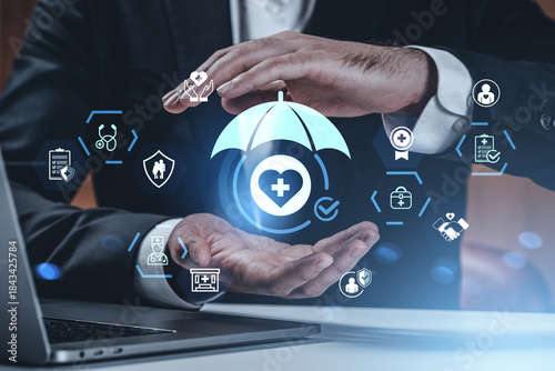 фотографія Futuristic digital healthcare system concept with doctor icons and man protecting medical umbrella icon on tech background interface