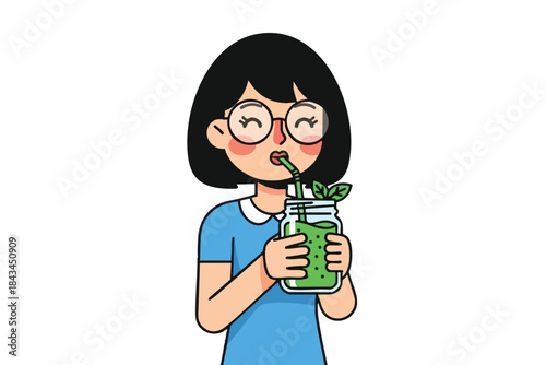 A person with glasses and a blue dress is drinking a green smoothie from a jar