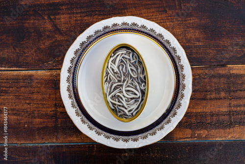 Canister of canned elvers