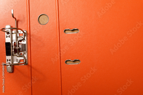Close up of an orange binde...