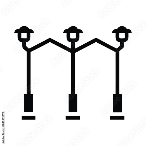 Simple black and white icon representing three connected streetlights illuminating an urban pathway or square