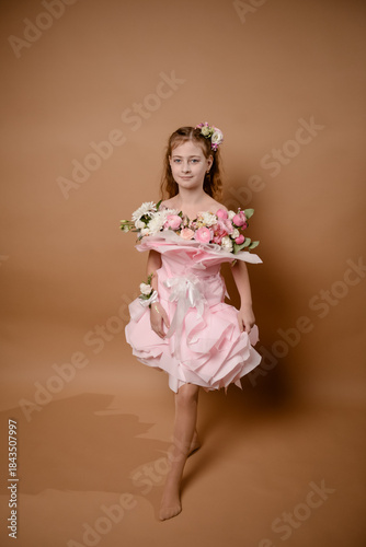 photo session of a girl in a bouquet of fresh flowers