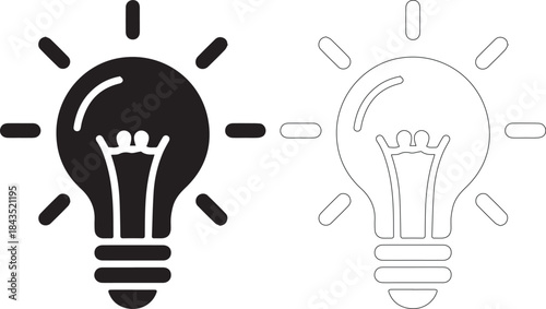 Black and white light bulb icons with rays on isolated