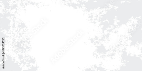 Abstract blue grunge winter background featuring a decorative snowflake pattern and frosty texture frame with central copy space for your holiday xmas card design