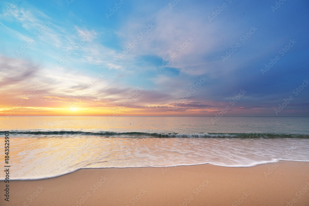 Fototapeta premium Sandy seashore at sunset. Nature composition.