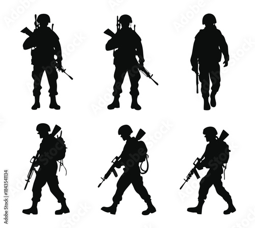 Silhouettes of soldiers standing and walking with rifles
