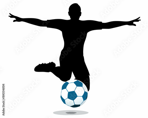 A silhouette of a soccer player jumping and balancing on a ball