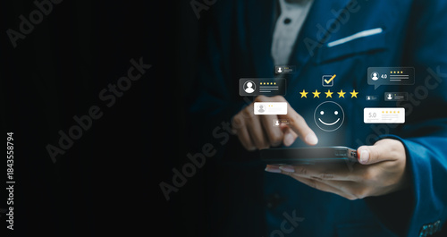Tableau sur toile Customer satisfaction concept, businessman using smartphone with five star rating icons, positive feedback review, service quality, user experience, online reputation, trust loyalty