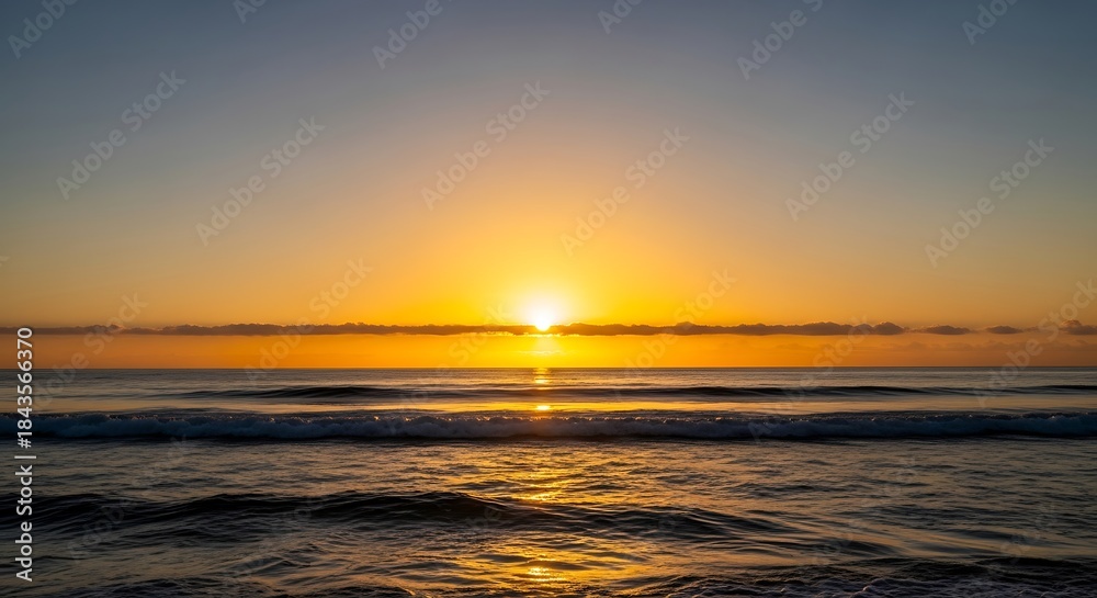 Obraz premium Glimmering horizon, vibrant sunrise reflecting on the ocean's surface