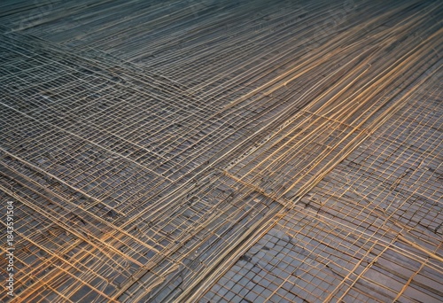 Structural Pattern of Overlapping Rebar Illuminated by Evening Light