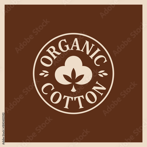 This logo design features a leaf symbol and text emphasizing organic cotton, illustrating eco-friendliness and sustainability essential for environmentally conscious consumers.