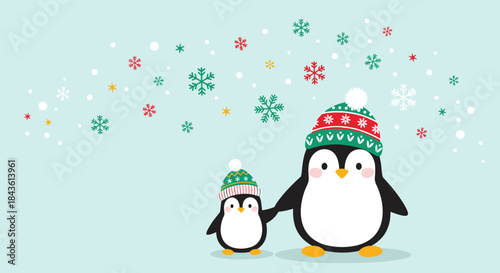 Two penguins wearing cozy knit hats stand side by side in a cheerful winter scene as colorful snowflakes fall softly around them.