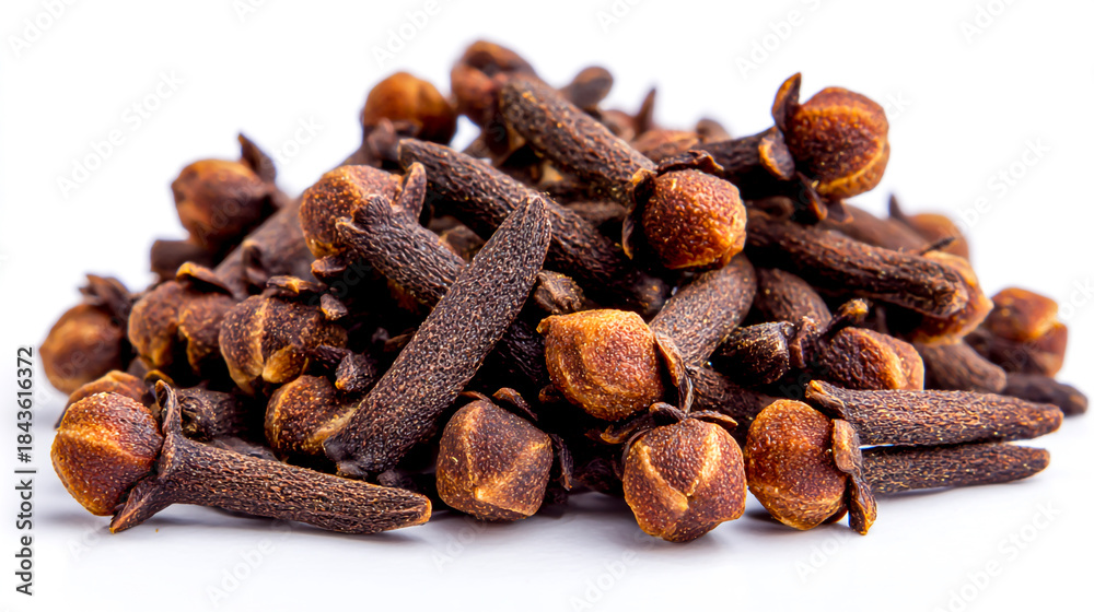 Fototapeta premium A pile of fresh cloves on a white background