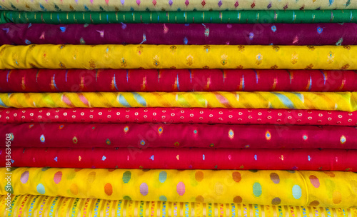 Multi Coloured Catalogue of Clothing Materials and Designs background