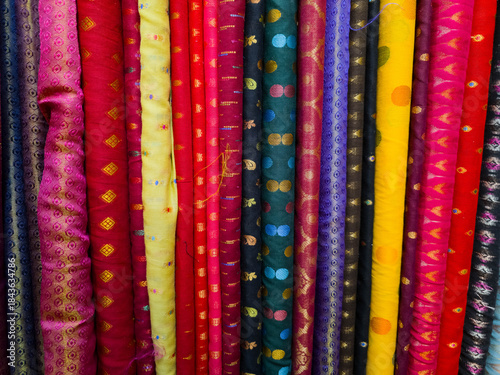 Multi Coloured Catalogue of Clothing Materials and Designs background