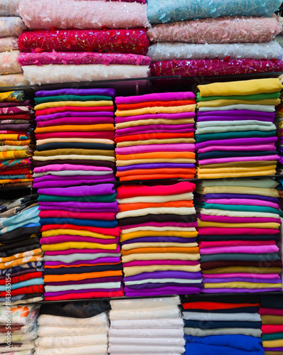Multi Coloured Catalogue of Clothing Materials and Designs background