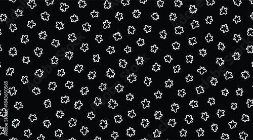 white flower outlines on black background pattern for design